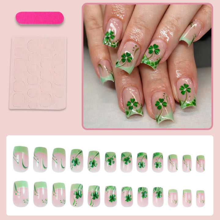 Artificial nail set with festive glitter and clover motifs Stornfield