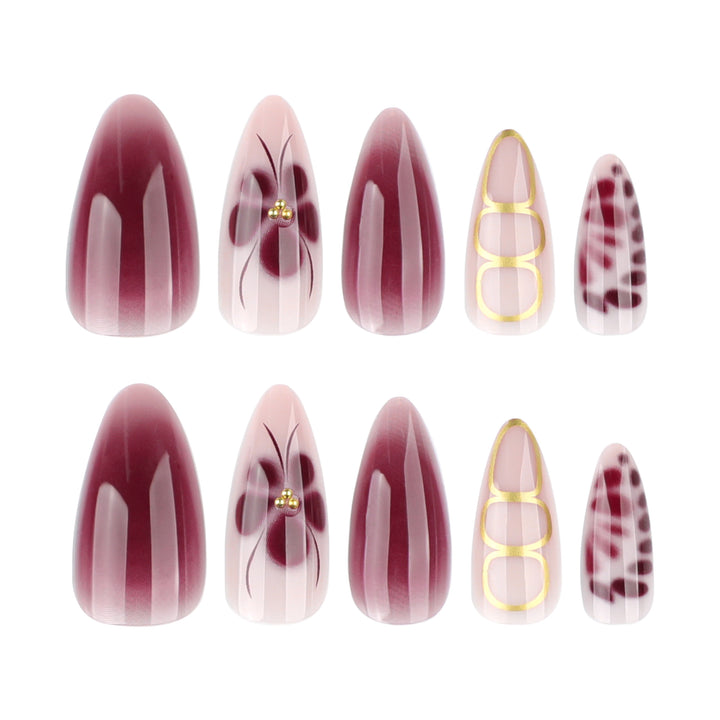 Elegant Nail Art with Floral Design and Glitter Accents Stornfield
