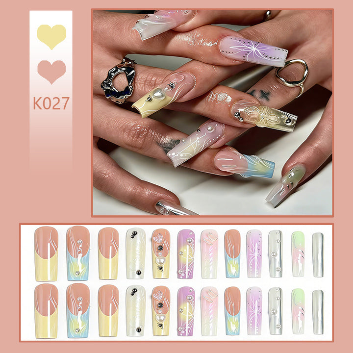 Artificial nail set with elegant floral and sparkling accents Stornfield