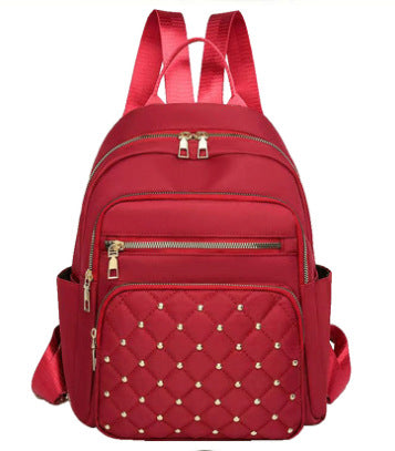 Women's Quilted Backpack with Decorative Studs Stornfield