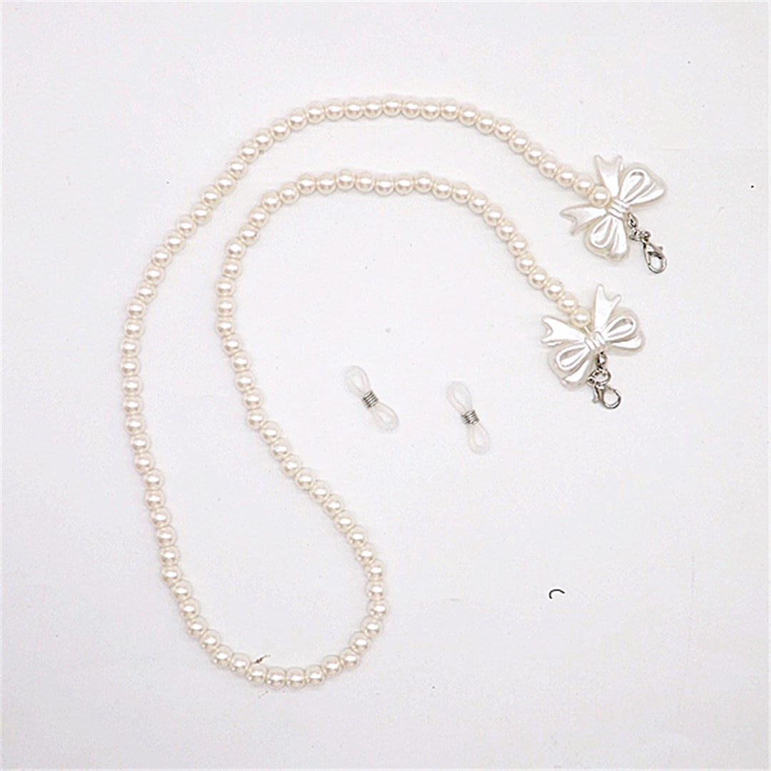 Elegant pearl glasses chain with bow pendants Stornfield