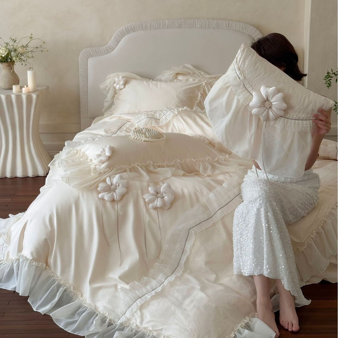 Romantic bedding set made of cotton satin with ruffled flounce, layered ruffles, and decorative fabric flowers