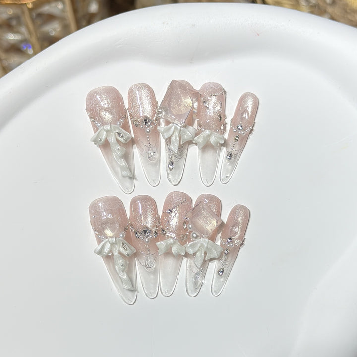 Elegant Press-On Acrylic Nail Set with Decorative Bow and Glitter Accents Stornfield