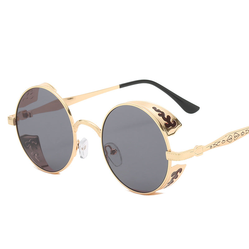 Ladies round sunglasses with luxurious gold frame and decorative elements Stornfield