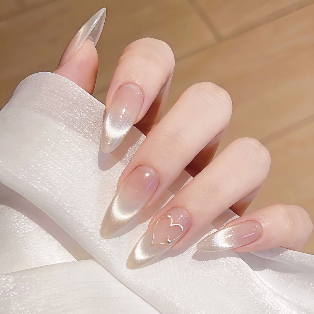 Elegant Stiletto Nail Extensions with Heart Accents