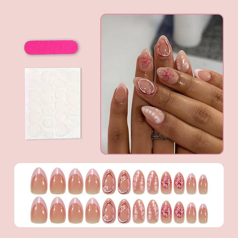 Artificial nail set with floral decorations and elegant accents Stornfield