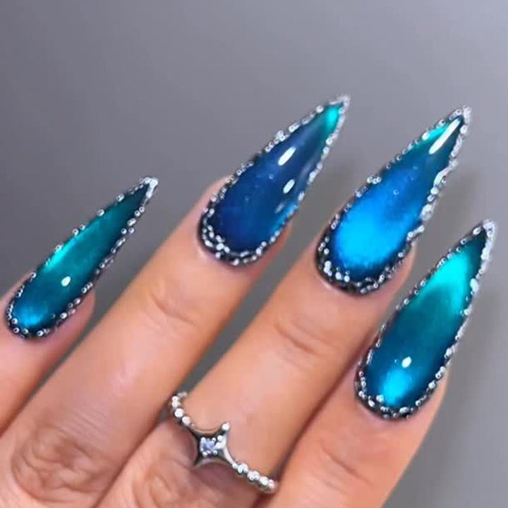 Glamorous artificial nails in elegant stiletto design with sparkling accents Stornfield