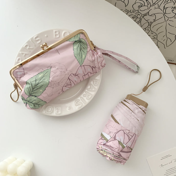 Ladies elegant folding umbrella with floral design and practical case Stornfield