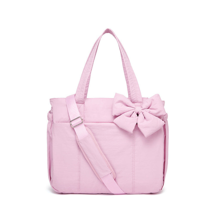 Fashionable tote bag with elegant bow appliqué Stornfield