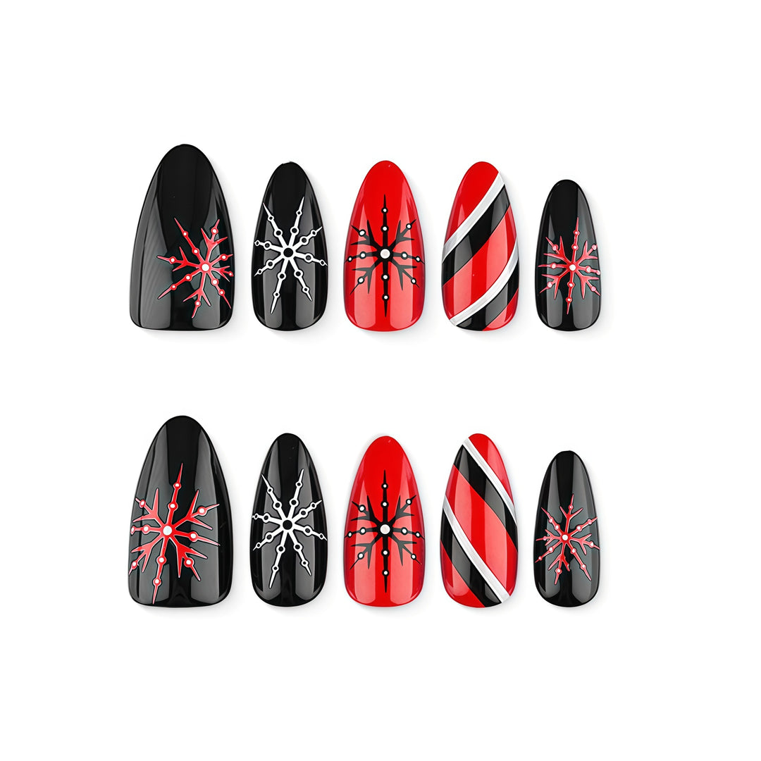 Artificial nails in modern stiletto design with graphic accents Stornfield