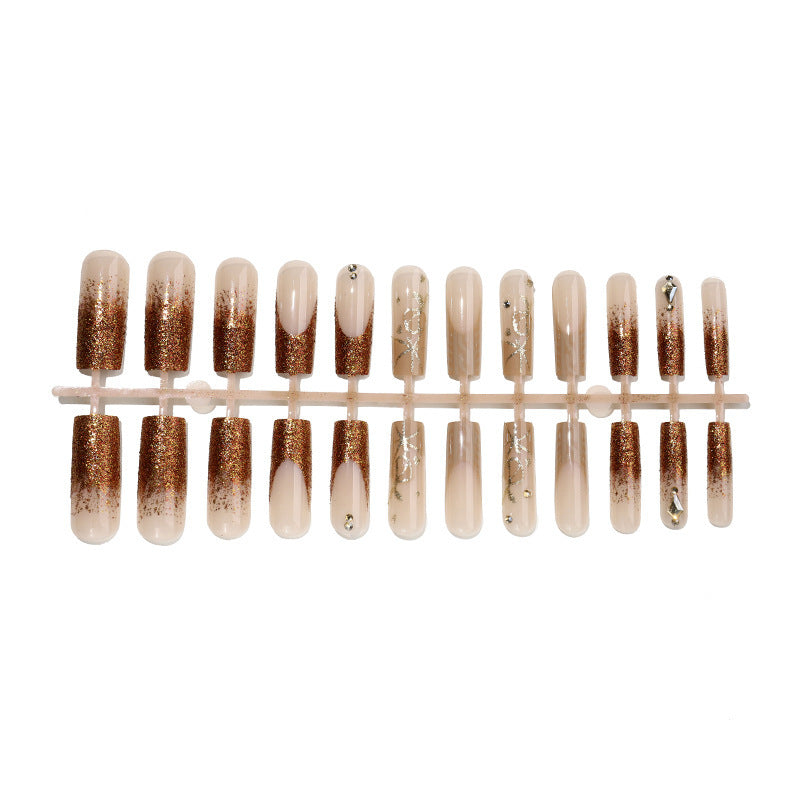 Artificial nail set with glamorous glitter and decorative elements Stornfield