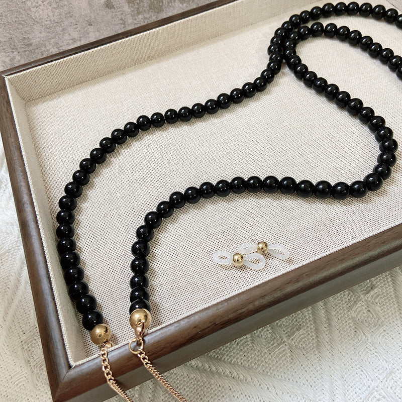 Fashionable jewelry band made of onyx beads Stornfield