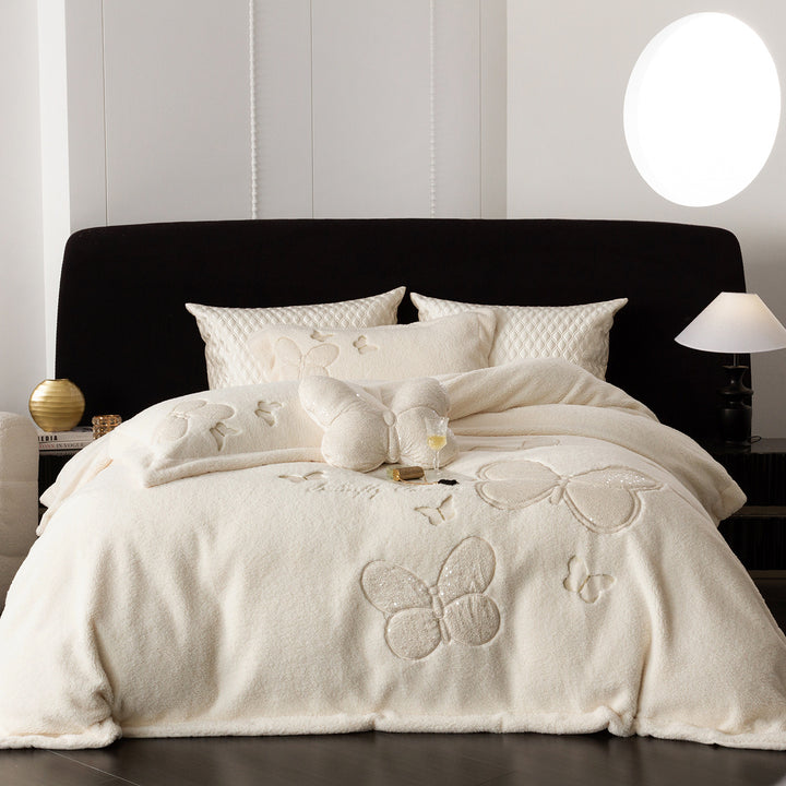 Cozy bedding and throw blanket set with applied butterfly appliqués and velvety microfleece look