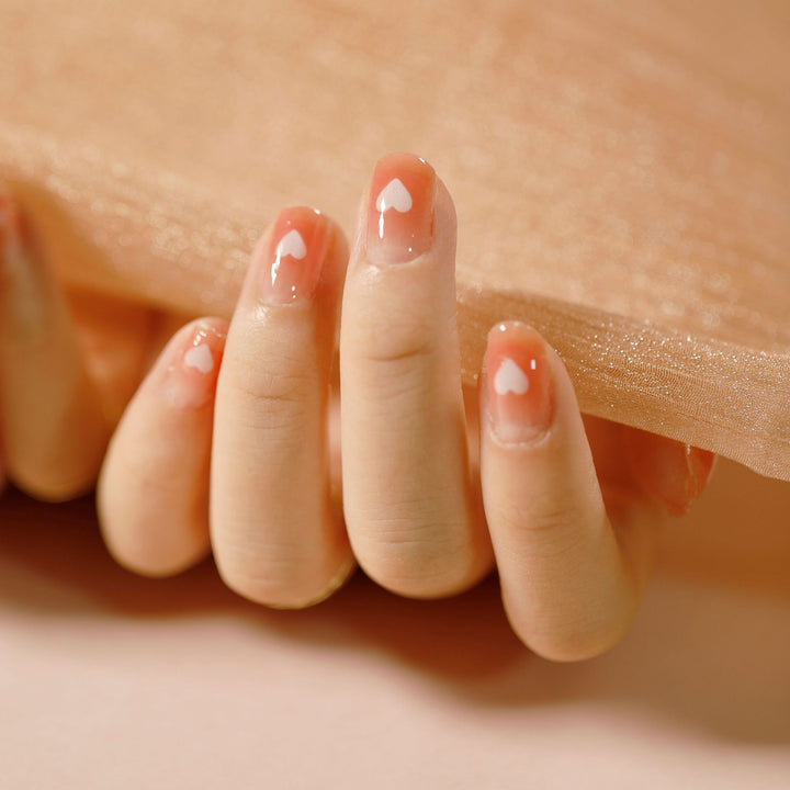 Artificial nail design with heart motif Stornfield