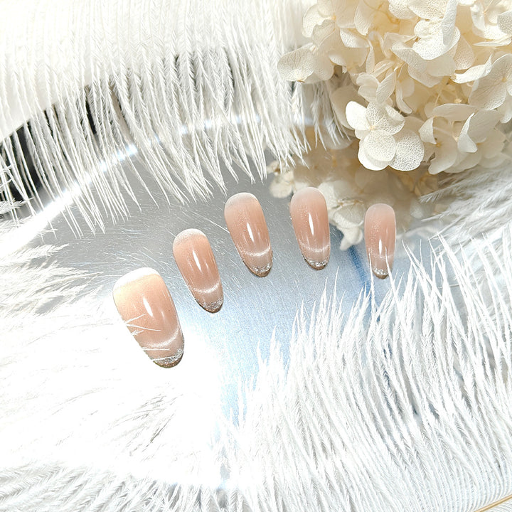 Artificial nails in elegant French manicure design Stornfield