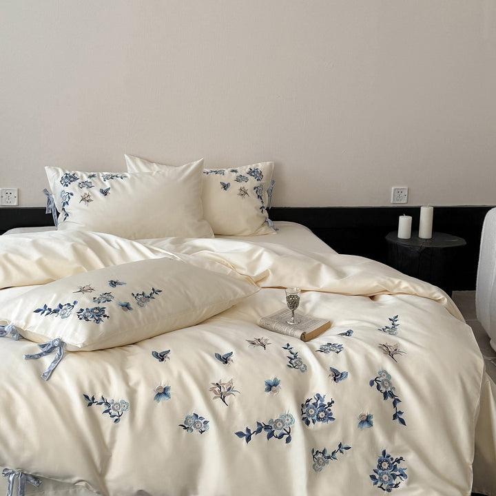 Luxury Cotton Sateen Bed Linen Set with Hand-Style Blue Floral Embroidery & Bow-Tie Shams