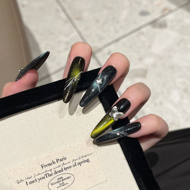 Artistic Stiletto Nail Extensions with Metallic Accents Stornfield