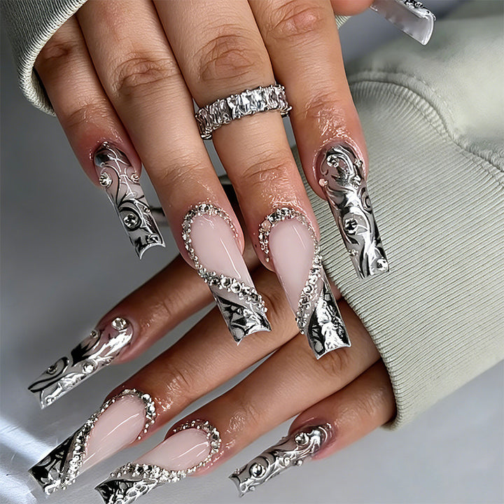 Elegant artificial nails with stylish embellishments Stornfield