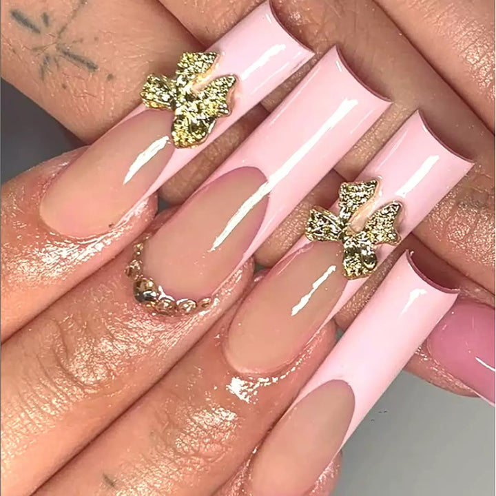 Artificial nail tips with glamorous flower embellishments Stornfield
