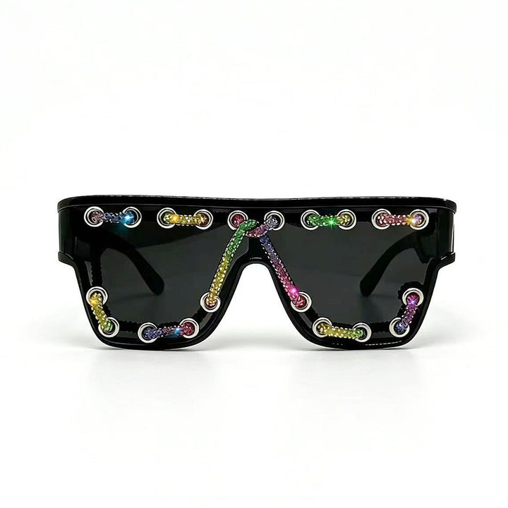Ladies sunglasses with extravagant design and decorative chain embellishment Stornfield