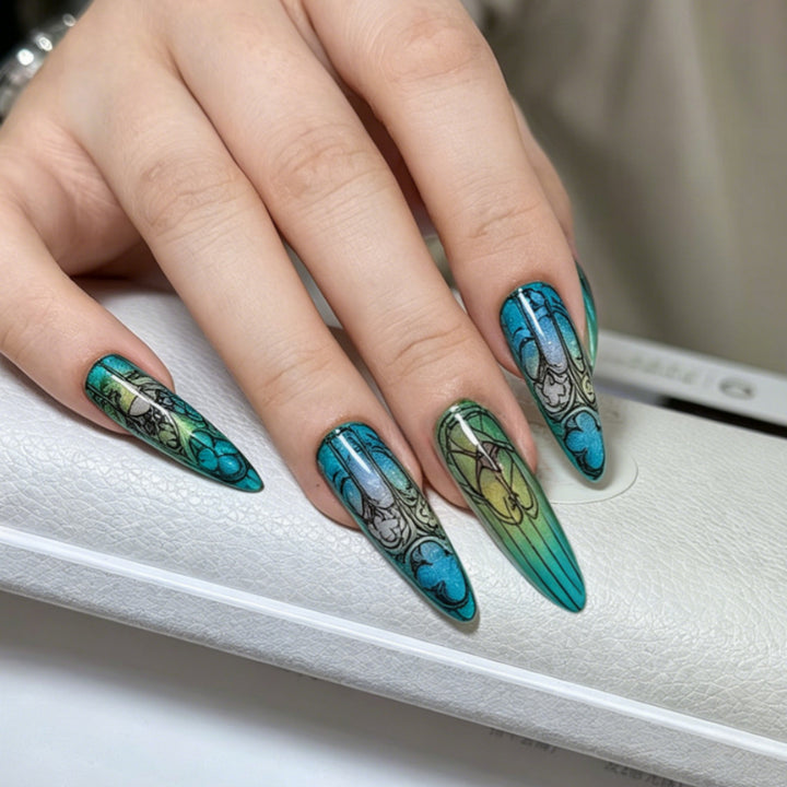 Artificial nails in elegant stiletto design with elaborate motifs Stornfield