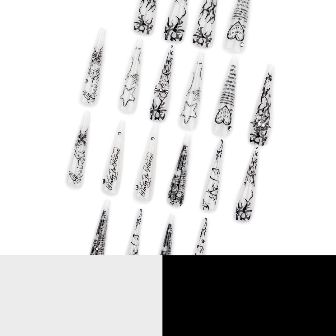Artful stiletto nails with gothic pattern and embellishments Stornfield