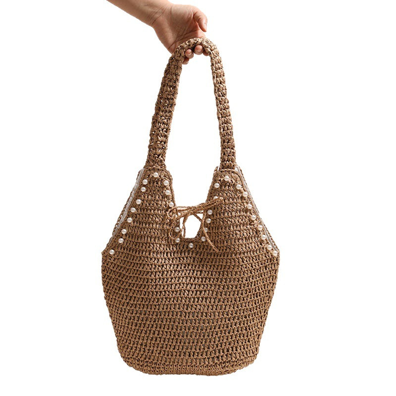 Handbag with pearl decor and innovative closure Stornfield