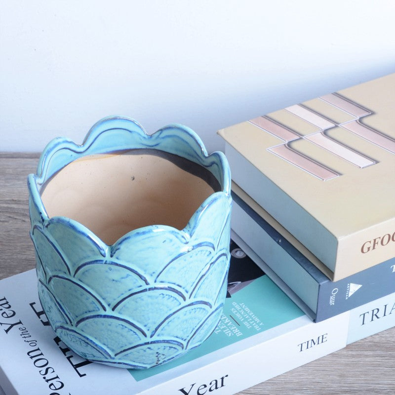 Decorative ceramic pot with sculptural design Stornfield