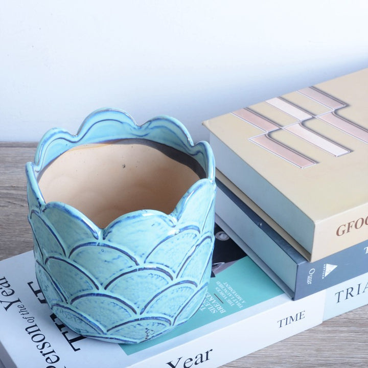 Decorative ceramic pot with sculptural design Stornfield