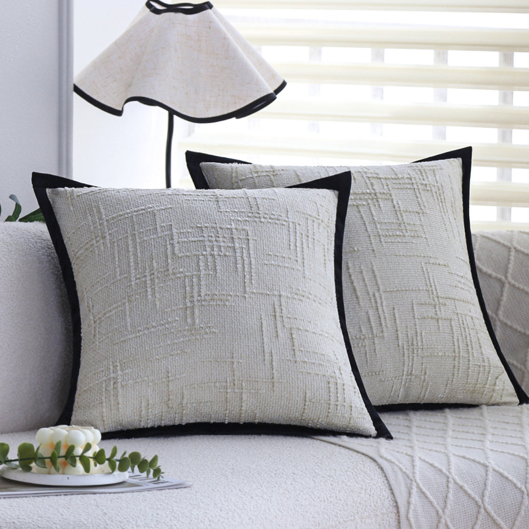 Square decorative cushion cover with structured grid tufting and contrasting piping Stornfield