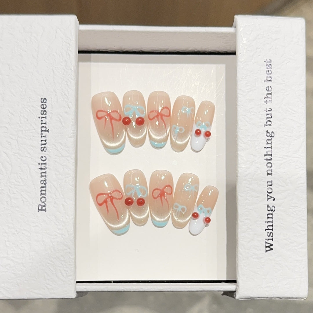 Artificial nail tips with romantic bow and cherry motifs Stornfield
