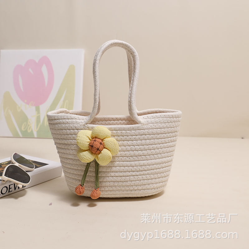Handcrafted basket bag with floral accents Stornfield