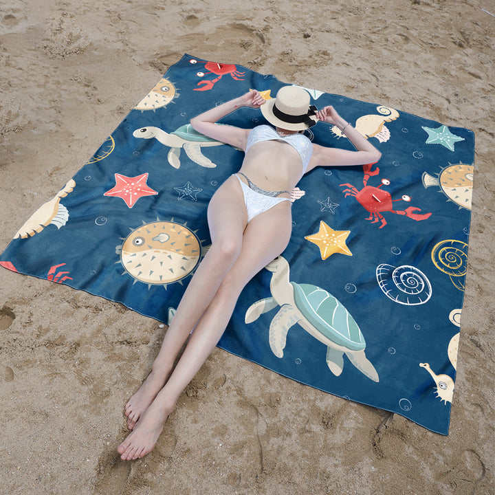 Beach blanket with colorful turtle pattern Stornfield