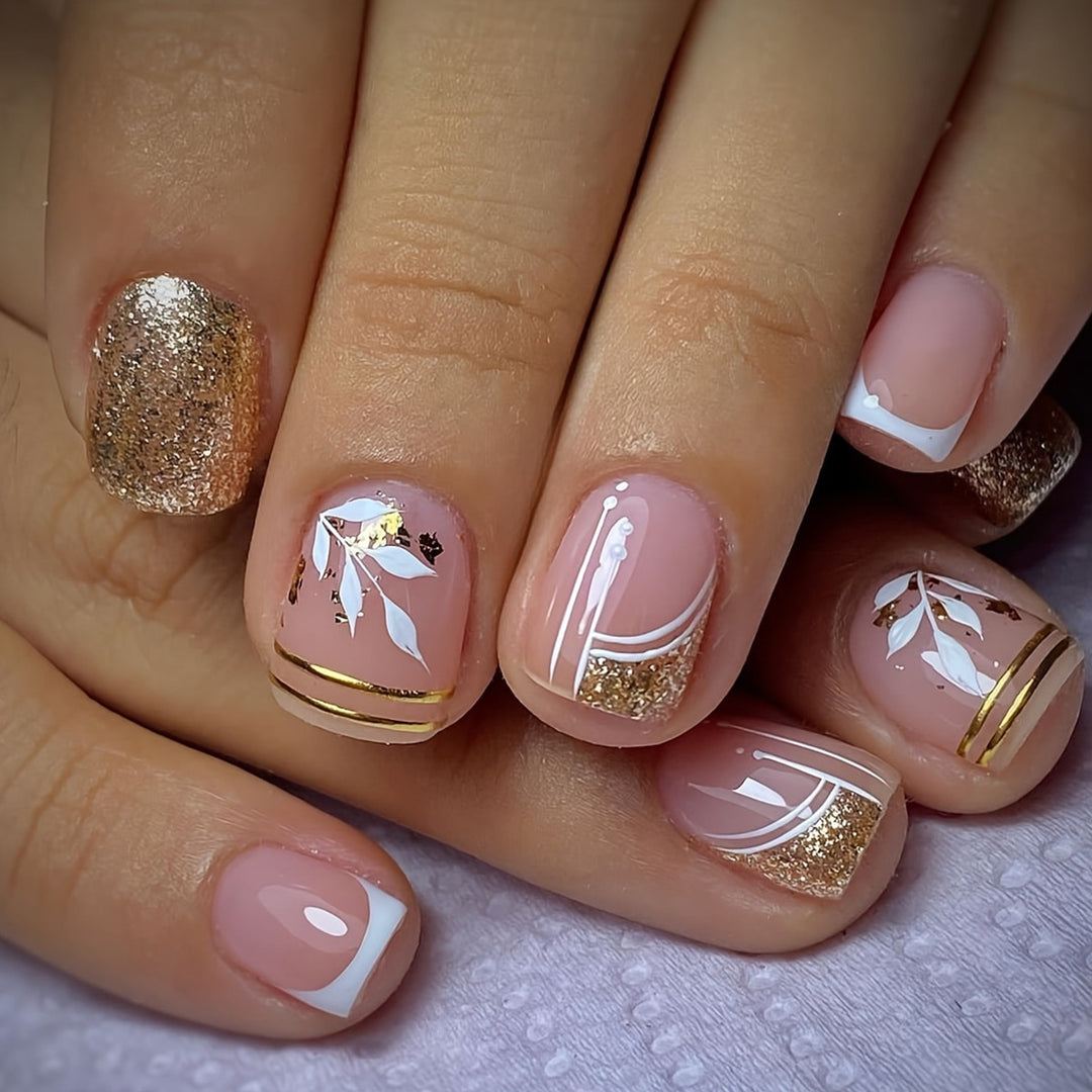 Elegant and creative artificial nails with gold accents Stornfield