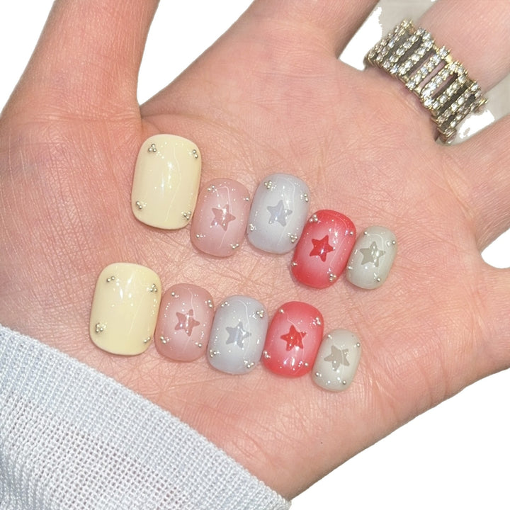 Artificial nails with sparkling star motifs Stornfield