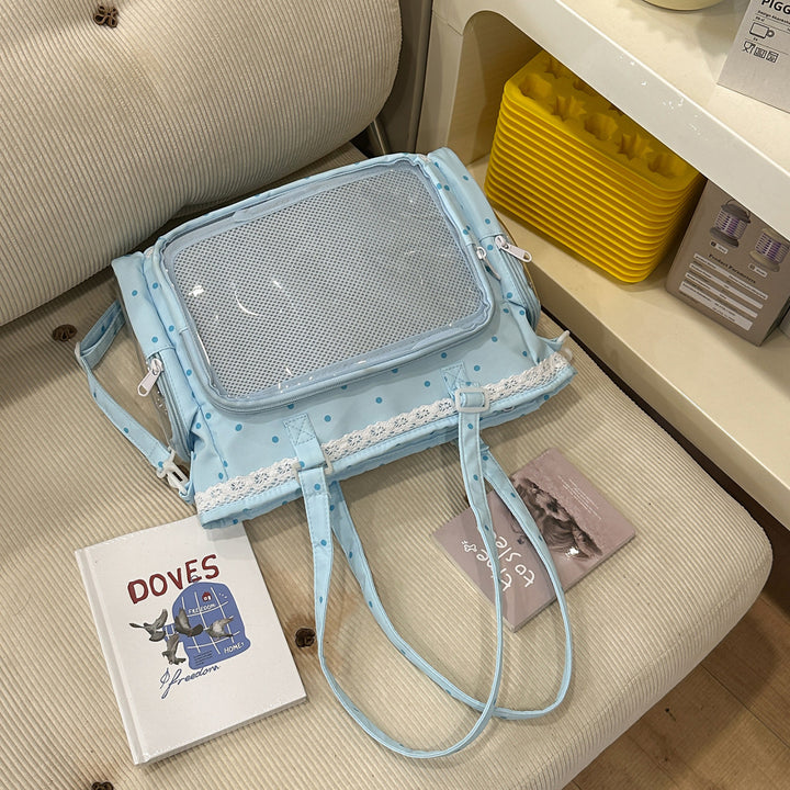 Handbag with Transparent Compartment Division and Playful Application Design Stornfield