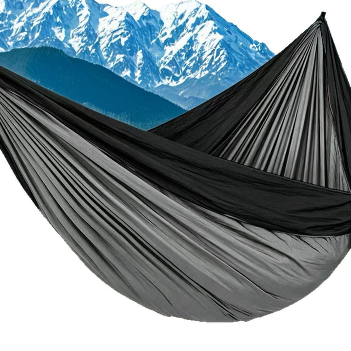 Ultralight portable parachute camping hammock with reinforced tree straps and ripstop nylon Stornfield