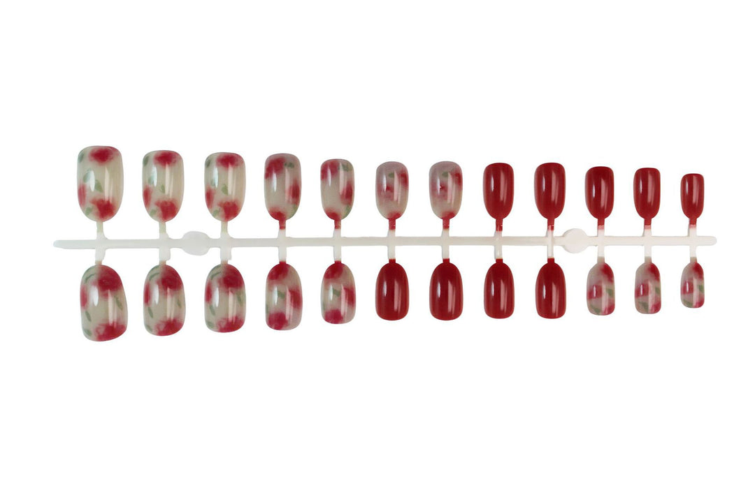 Nail art set with floral accents and glossy finish Stornfield