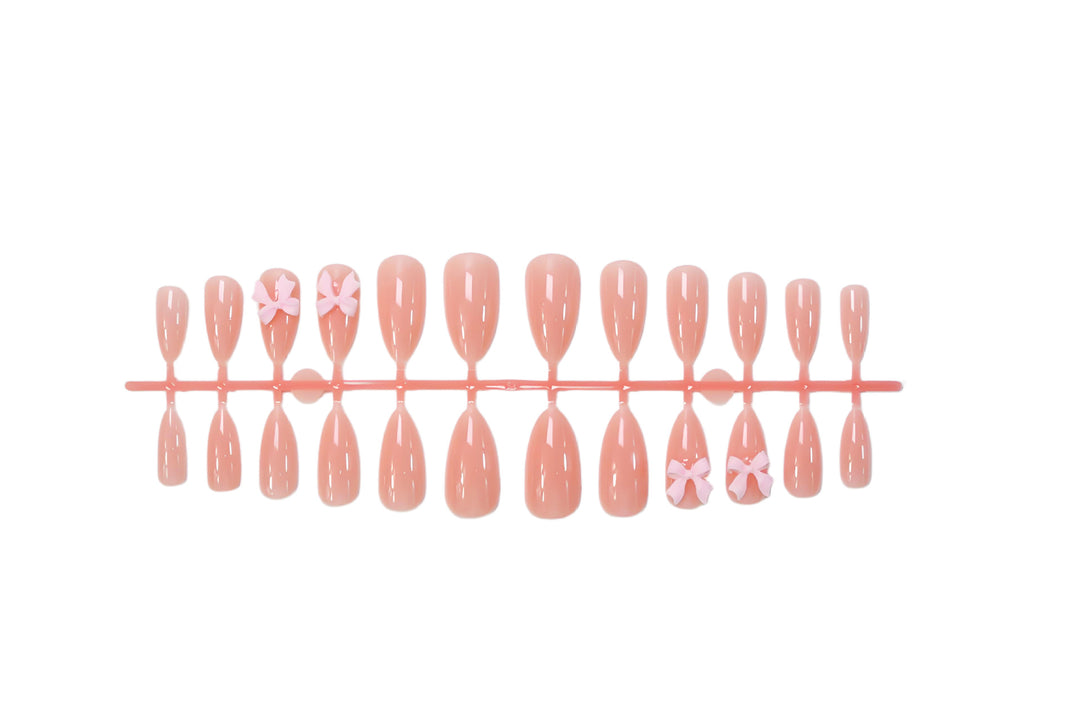 Artificial nail set with delicate bow embellishments Stornfield