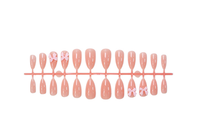 Artificial nail set with delicate bow embellishments Stornfield