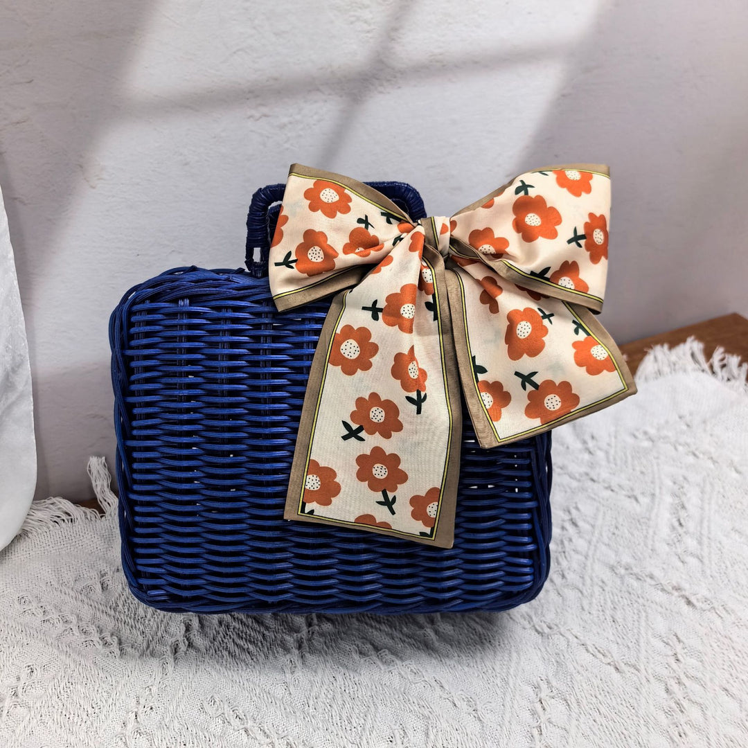 Women elegant handbag made of woven material Stornfield