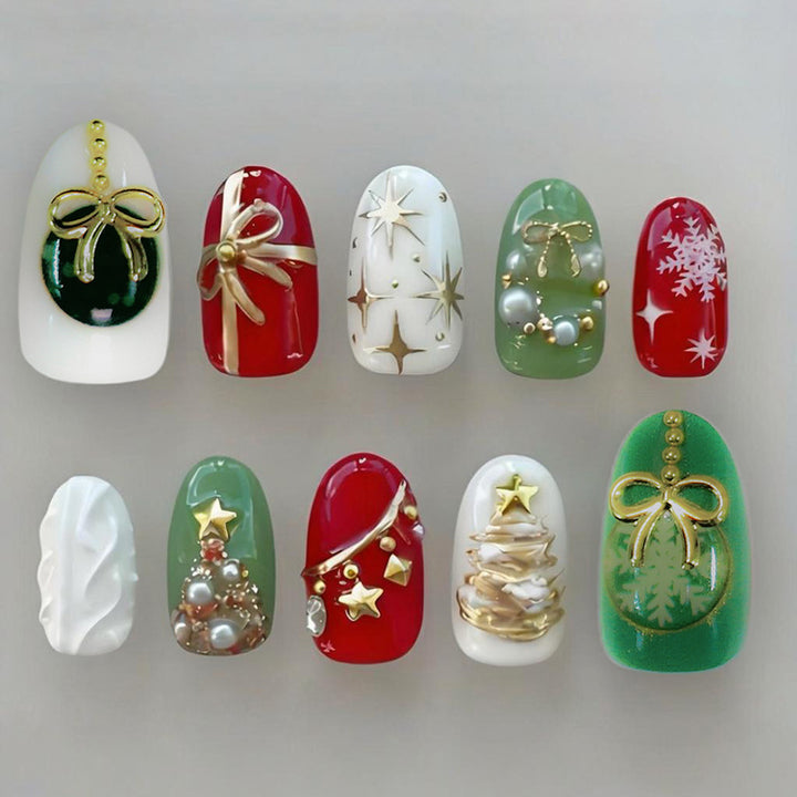 Artificial nail set with festive Christmas motifs and glamorous gold decorations Stornfield