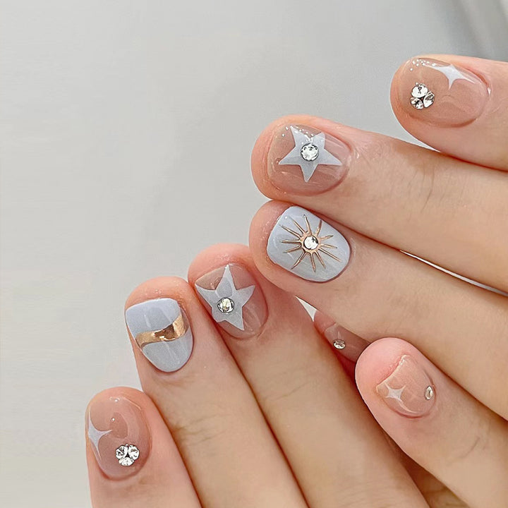 Artistic Press-On Nail Set with Glittery Star Accents Stornfield
