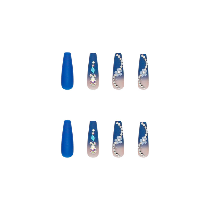 Nail art set with elegant 3D flower designs and glitter accents Stornfield