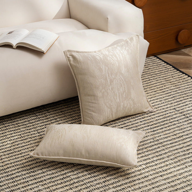 Square decorative cushion with structured Jacquard surface and piped seam
