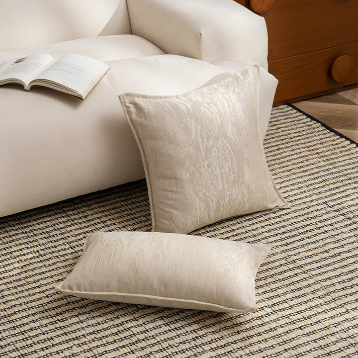 Square decorative cushion with structured Jacquard surface and piped seam