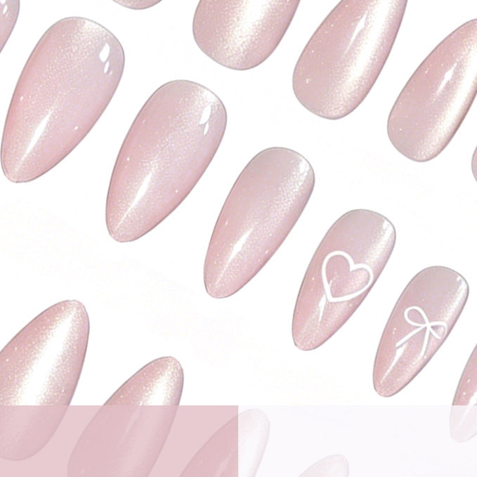 Elegant Heart and Bow Nail Art Stornfield