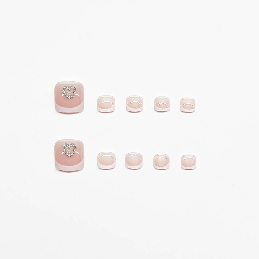 Acrylic nail set with playful heart design Stornfield