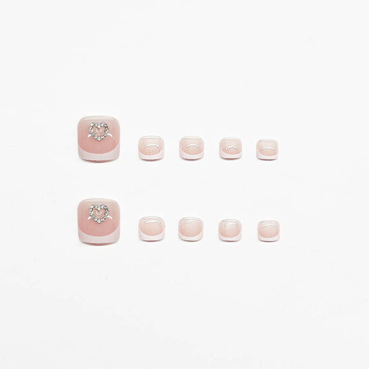 Acrylic nail set with playful heart design Stornfield
