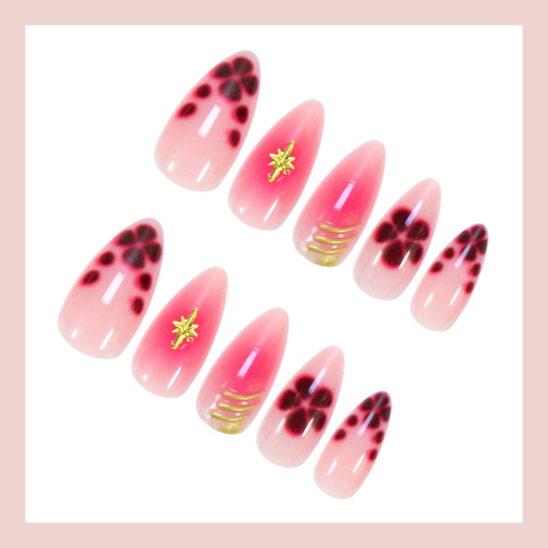 Artificial nails with elegant flower and glitter patterns Stornfield